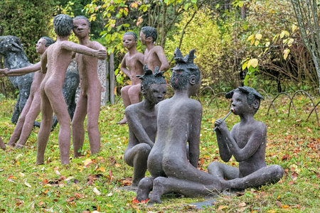 PARIKKALA, FINLAND - OCTOBER 9, 2011: Sculptures by ITE-artist Veijo Ronkkonen in his sculpture park (Parikkalan patsaspuisto). The park contains about 560 concrete statues and a magnificent garden.のeditorial素材