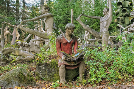 PARIKKALA, FINLAND - OCTOBER 9, 2011: Sculptures by ITE-artist Veijo Ronkkonen in his sculpture park (Parikkalan patsaspuisto). The park contains about 560 concrete statues and a magnificent garden.のeditorial素材