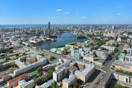 YEKATERINBURG, RUSSIA - AUGUST 19, 2016: View of historical center, city pond and Yekaterinburg-City district from observation deck on the 52nd floor of Vysotsky skyscraper at 186 m above the ground.のeditorial素材
