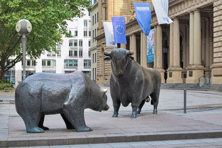 FRANKFURT, GERMANY - MAY 12, 2018: The bear and the bull sculpture in front of the Frankfurt Stock Exchange. The sculpture by Reinhard Dachlauer was created in 1985 and erected on October 6, 1988.のeditorial素材