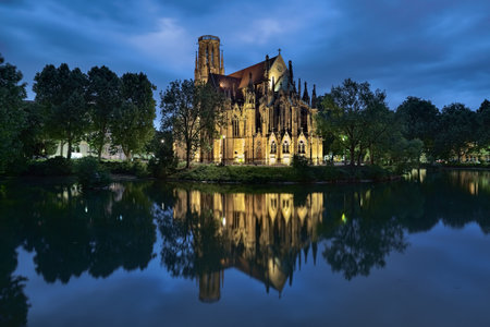 Stuttgart, Germany. Johanneskirche (St John's Church) on the Feuersee (Fire Lake) in dusk. The church was built in 1864-1876.のeditorial素材