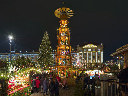 DRESDEN, GERMANY - DECEMBER 6, 2017: Christmas pyramid at Striezelmarkt in night. The Striezelmarkt is the one of Germany's oldest documented Christmas markets. It was first mentioned in 1434.のeditorial素材