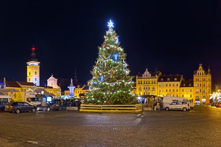 CESKE BUDEJOVICE, CZECH REPUBLIC - DECEMBER 8, 2017: Christmas market with Christmas tree at Premysl Otakar II Square in night. The Black Tower and St Nicholas Cathedral are visible in the background.のeditorial素材