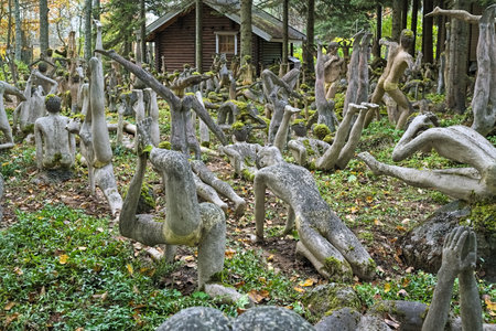PARIKKALA, FINLAND - OCTOBER 9, 2011: Yoga garden in the sculpture park (Parikkalan patsaspuisto) by ITE-artist Veijo Ronkkonen. The park contains about 560 concrete statues and a magnificent garden.のeditorial素材