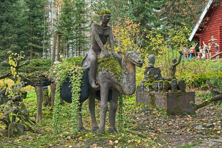 PARIKKALA, FINLAND - OCTOBER 9, 2011: Sculptures by ITE-artist Veijo Ronkkonen in his sculpture park (Parikkalan patsaspuisto). The park contains about 560 concrete statues and a magnificent garden.のeditorial素材