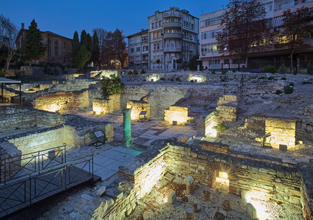VARNA, BULGARIA - OCTOBER 4, 2017: Small Ancient Roman Thermae in twilight. It is ruins of public baths built in 4th-6th century AD in the city of Odessus (Odessos in Greek, old name of today's Varna)のeditorial素材