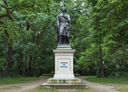 Friedrich Schiller monument at Maximiliansplatz square in Munich, Germany. The monument was unveiled in 1863. It was commissioned by King Ludwig I and designed by the German sculptor Max von Widnmann.のeditorial素材
