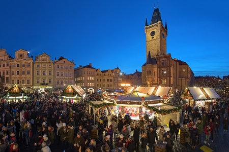 PRAGUE, CZECH REPUBLIC - DECEMBER 11, 2019: Christmas market at Old Town Square with Old Town Hall in background. This is the main Christmas market in Prague and the largest one in the Czech Republic.のeditorial素材