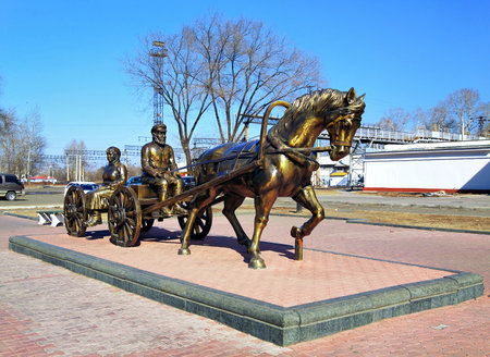 BIROBIDZHAN, RUSSIA - MARCH 9, 2008: Monument to first settlers near the Birobidzhan railway station. The monument by design of artist Vladislav Tsap was unveiled in 2004.のeditorial素材