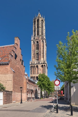 UTRECHT, NETHERLANDS - MAY 25, 2013: Dom Tower of Utrecht Cathedral. It was built in 1321-1382. Since the unfinished cathedrals's nave collapsed in 1674, the Dom tower has been a freestanding tower.のeditorial素材