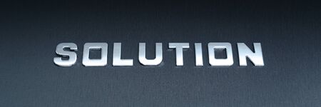Word solution spelled with chrome letters on aluminium background in a conceptual image for finding a solution to a problemの写真素材