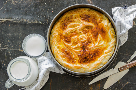 Homemade pie covered with apples, cinnamon,nuts Copyspaceの写真素材