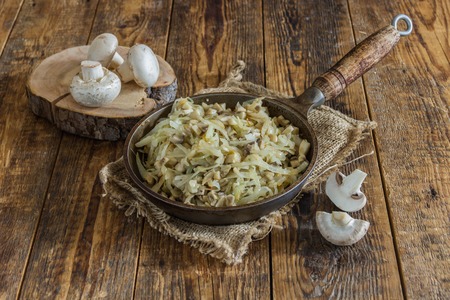 stir fried cabbage with chicken and mushroomsの写真素材