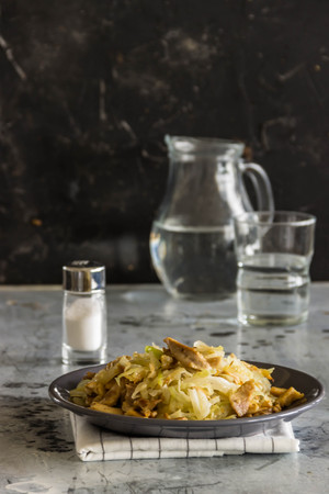 stir fried cabbage with chicken and mushroomsの写真素材