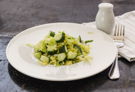 fresh vegetables salad with cabbage and frech cucumberの写真素材
