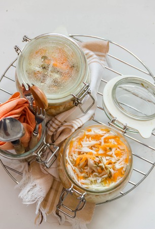 sauerkraut with fennel seeds, selective focus in a jarの写真素材