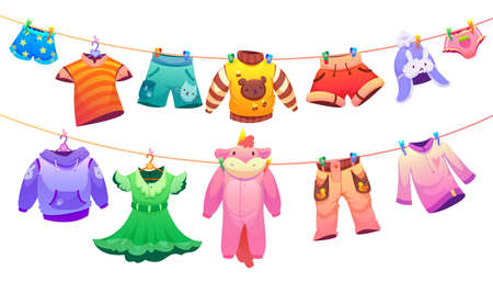 Kids fashion garment for boys and girls hanging on clothes line. Vector cartoon illustration of cute children apparel, t-shirts, shorts, dress, pajamas in shape of unicorn, sweaters, hat and pantsのイラスト素材