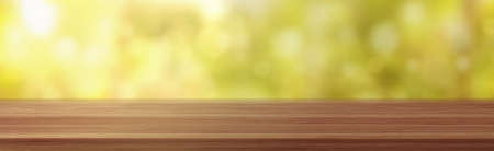 Wooden table perspective view on green blurred background. Wooden surface of desk, brown outdoor tabletop angle for products display, presentation, advertising, Realistic 3d vector illustrationのイラスト素材