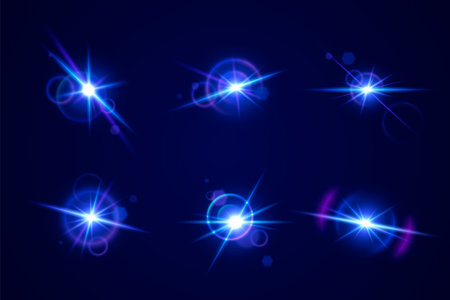 Glint and glare optical effects collection - bright blue luminous starbursts with radiant beams on dark background. Shimmering neon sparkles with lens flares, circular halos and bright bling.のイラスト素材