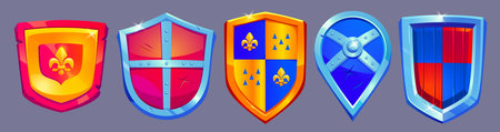 Medieval cartoon shields in red, blue and yellow colors with metallic edges. Various protective shapes with patterns and emblems. Fantasy game assets for knight character, rpg ui or historical battleのイラスト素材