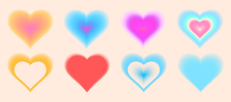 Heart gradient shapes in y2k style - colorful dreamy pastel blurred love sign. Hazy fuzzy neon Valentine day symbols in nostalgic retro 90s vibe. Smooth diffused edges, tender romantic design elementsのイラスト素材