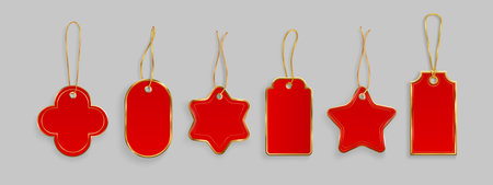 Red gift tags with gold string hanging loops - festive shapes of star and cross, oval and rectangle designs. Blank price labels for Christmas presents, retail merchandise or holiday decorations.のイラスト素材