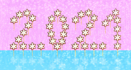 New year 2021 creative design concept. Gingerbread cookies in the shape of snowflakes on a stick....