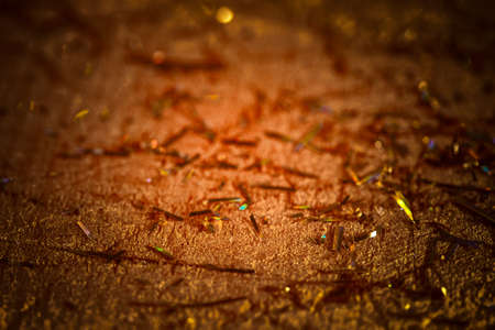 Blurred yellow-orange background in vintage style. Gradient background in grunge style. Abstract background in warm colors for your design, text for Christmas cards, covers.の写真素材