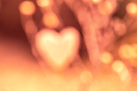 Blurred Hearts Background .Abstract Bokeh Background Free Space Text Valentine Background.Pastel background with pink and yellow accent.の写真素材
