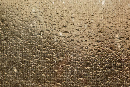 Abstract pastel blurred background. Beautiful gentle soft background. Minimalism. Abstract blurred bokeh .Water on glass.の写真素材