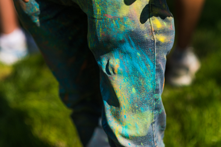 Holi painted legsの写真素材