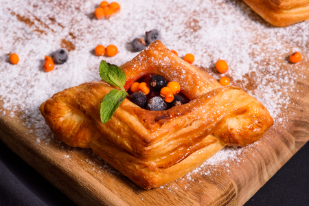 fresh homemade bakery with berries and toppingの写真素材