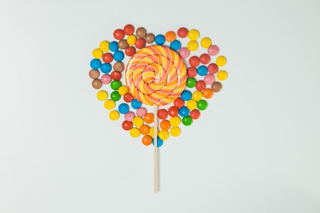 Chocolate Candy Lollipop White Background Lay Flat Sweet Love concept Top View Minimal  Patternの写真素材