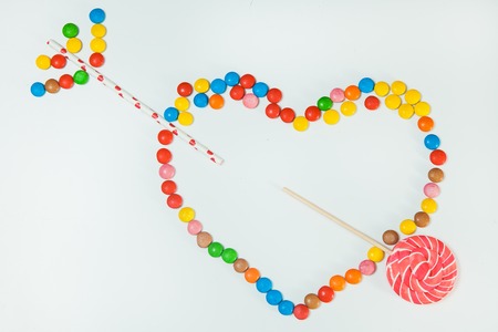Chocolate Candy Lollipop White Background Lay Flat Heart Arrow Love concept Holiday patternの写真素材
