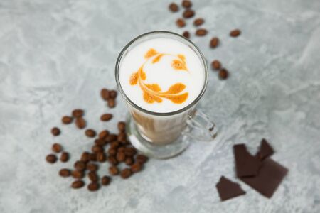 Latte coffee arabica espresso beans dark chocolate background. Time for coffee concept.の写真素材