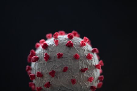 Creative photo of coronavirus sphere 3d model. Closeup macro shot of microscopic virus covid-19 molecule. Helthcare and medical concept.の写真素材