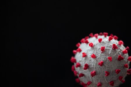 Creative photo of coronavirus sphere 3d model. Closeup macro shot of microscopic virus covid-19 molecule. Helthcare and medical concept.の写真素材