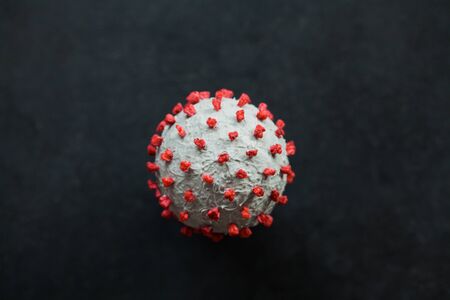 Creative photo of coronavirus sphere 3d model. Closeup macro shot of microscopic virus covid-19 molecule. Helthcare and medical concept. Selective focusの写真素材