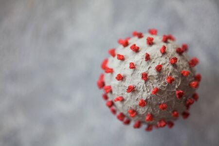 Creative photo of coronavirus sphere 3d model. Closeup macro shot of microscopic virus covid-19 molecule. Helthcare and medical concept. Selective focusの写真素材