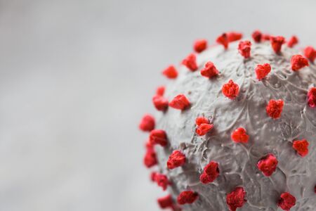 Creative photo of coronavirus sphere 3d model. Closeup macro shot of microscopic virus covid-19 molecule. Helthcare and medical concept. Selective focusの写真素材