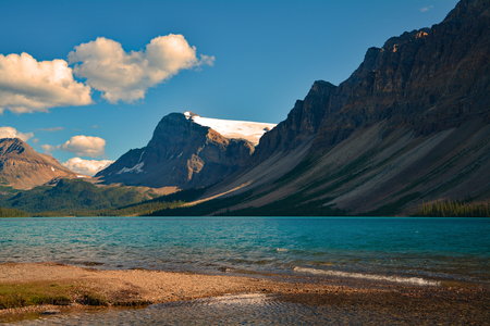 Canada british columbia blue water lake mountains snow landscapeの写真素材