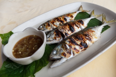Grilled scomber fish with special fish sauce.の写真素材