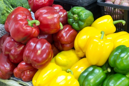 Multiple Colorful Fresh Bell Peppers in Baskets 
