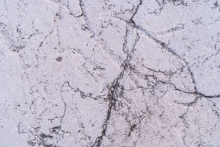 White stone with small cracks on the surface