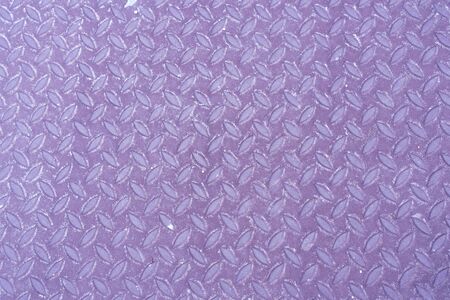 Gray metal texture with repeating leaf designsの写真素材
