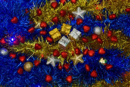 Christmas gift packages in the middle of the decorationsの写真素材