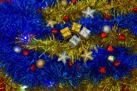 Christmas gift packages in the middle of the decorationsの写真素材