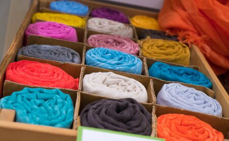 Colored scarves on sale in the shopの写真素材