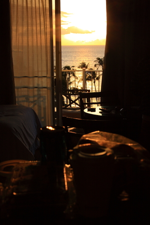Hotel room with sunset viewの写真素材
