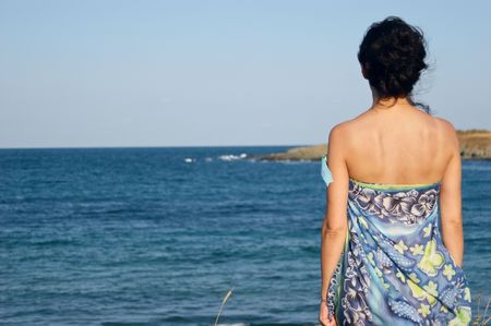 Woman posing on the beachの写真素材